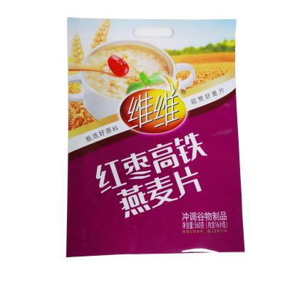 China Security Pouches China Manufacturers 560g Bag Aluminum Foil Packaging Bags For Oats With Punch Handle for sale