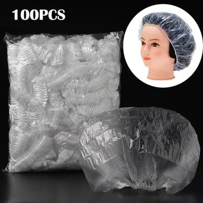 China Hair Salon Disposable Plastic Clear Hotel Spa Hat 100pcs Unique Bathing Shower Bathroom Products Elastic Bath for sale