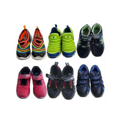 China Cushioning Children Used Shoes In Breathable Boys Shoes Used By Hot Sale Ball Mesh Sneaker Lightweight Second Hand Kids Shoes for sale