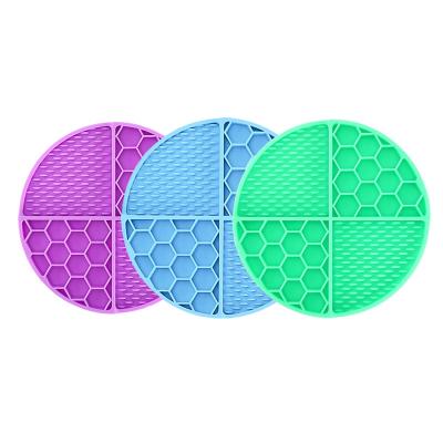 China Stocked Round Honeycomb Silicone Slow Feeding Dog Lick Mat With Suction Cups for sale