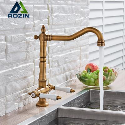 China Contemporary Antique Brass Ceramic Euro Double Handle Faucet Retro Kitchen Rozin Sink Mixer Wash Faucet For Bathroom Deck Mounted for sale