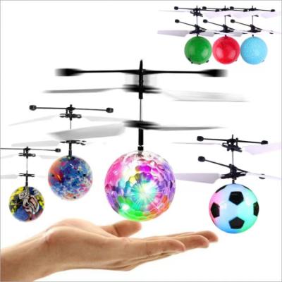 China Educational Toys Spinners Metal Finger Globe UFO Squid Game Bracelet Led Light Up 3D Ring Duo Cube Flight Spinner Ball Anime figure for sale