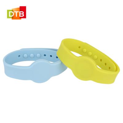 China Waterproof / Waterproof Adjustable DTB 13.56mhz RFID Wristband NFC Silicone Wristband for sale