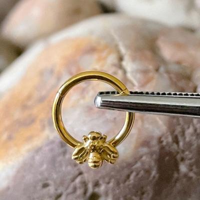 China 2022 Nose ring inspired by titanium honey bee insect septum astm f136 designer hinged open nose ring bee spinner rings for sale