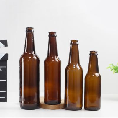 China Amber Beer With Crown Cap 330ml 300ml 250ml Beverage Glass Bottle for sale