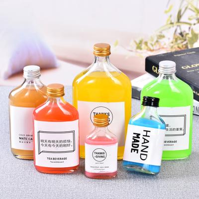 China Flat Cold Square Beverage 350 Ml Brew Coffee Glass Bottle Juice Glass Bottle for sale