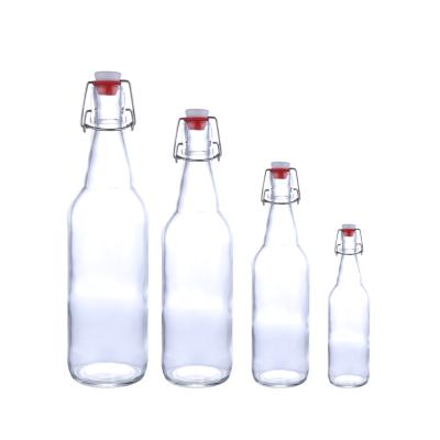 China Airtight Rubber Seal 500ml 330ml Empty Clear Glass Swing Top Beer Bottle Daily Life Home Glass With Wire Easy Swing Cap for sale