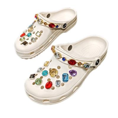 China 2020 fashion woman lady sandal slipper girl unique clog new design customs breathable EVA rhinestone glitter garden shoe candy color thick sole for sale