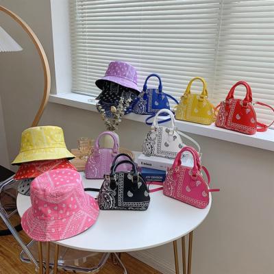 China Lady Logo Travel Bag Diagonal Fashion Style Western Handbag and Hat Set Cashew Flower Shell Bag Single Shoulder Bag for sale