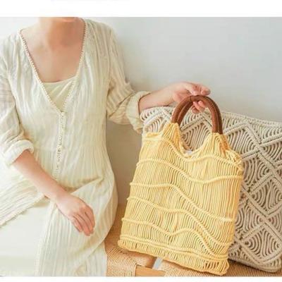 China 2020new cotton manufacturers direct style korean women's fashion handbags, solid color tassels, handwoven for sale