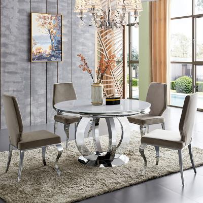 China Modern Glass Top Round Dining Table Set 6 Seater Home Furniture Round Stainless Steel Glass Dining Table for sale