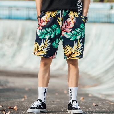 China Breathable Hawaii Vacation Beach Shorts Men's Summer Loose Sports Tend Five Pants Wholesale for sale