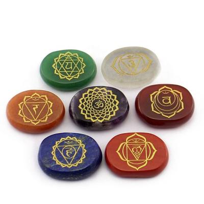 China India Natural Stone Carve Yoga 7 Chakras Symbol Sanskrit Oval Open 7 Color Chakra Meditation Ornament Healing Crystal Home Decor for sale