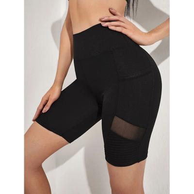 China Breathable Women Shorts Gaiters High Waist Cutout Yoga Pants Black Splice Leggings Yoga Pants for sale