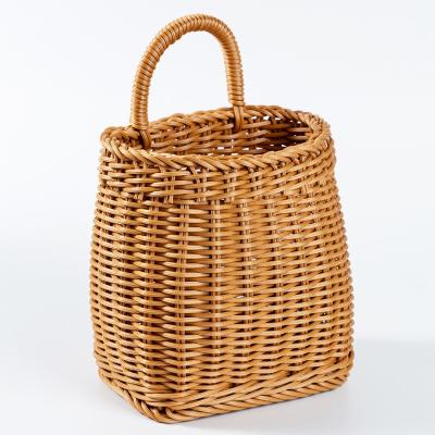 China Amazon Popular Rattan Woven Kitchen Ginger Garlic Storage Basket Flower Wall Mounted Portable Basket Viable for sale