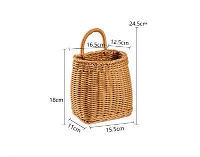 China Viable Amazon Basket Kitchen Ginger Garlic Onion Eggs Rattan Woven Fruit Wall Hanging Basket for sale