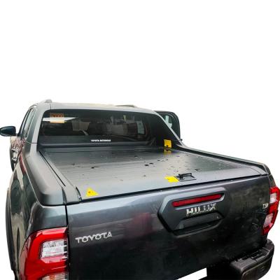 China Chinese Made Pickup Truck Bed Cover Roll Pop-Up Cover Lock For Toyota Hilux Manual Tonneau Cover for sale