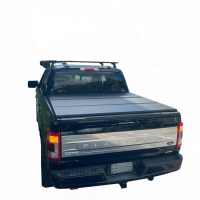 China Truck Cover Pickup Hard Triple Tonneau Covers High Quality Hard Aluminum Folding Tri Bed Covers For Pickup F150 Ford Ranger for sale