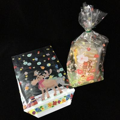 China Recyclable Cheap Plastic Packaging Flat Bottom Opp Bags Treat Party Favor Bag For Candy Bakery Cello Gift Bag for sale