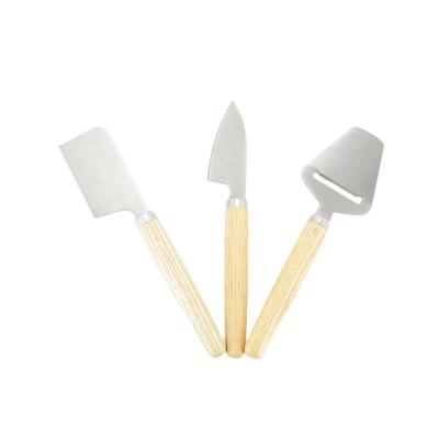 China Sustainable Small Size 02W01 Stainless Steel Food-Rated 3 PC Cheese Tool With Bolster Ashwood Handle for sale