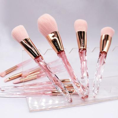 China 12 Pieces Plastic Cosmetic Base Make Up Powder Eyeshadow Highlight Concealer Tool Rose Handle Crystal Makeup Brush for sale