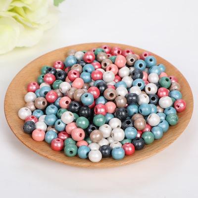 China Diy Hot Selling Round Timber Gold Mango New Bead Handmade Beads Jewelry Accessories Bead Sprinkle Wood Round Bead Accessories for sale