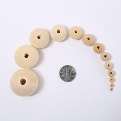 China Decoration or DIY/For Jewelry Making High Quality Unfinished Wood Bead Round Shaped Decorative Wooden Loose Beads For DIY Curtains for sale