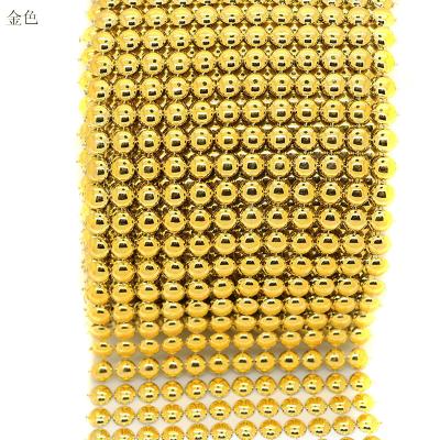 China Manufacturers 16 Tier Gold Blue Pyramid Flatback Mango Diamante Rhinestone Plastic Mesh Ribbon For Wedding Table Wrap for sale