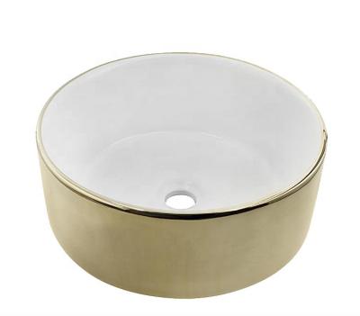 China Standing type Nordic ceramic gold basin table basin factory supply style ultra-thin construction style gold edge à venda