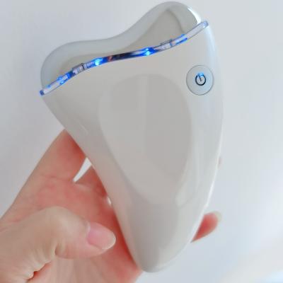 China 2021 Portable Best Selling Hot and Cool Facial Vibration Face Lifting Massager Anti Aging Face Massager for sale