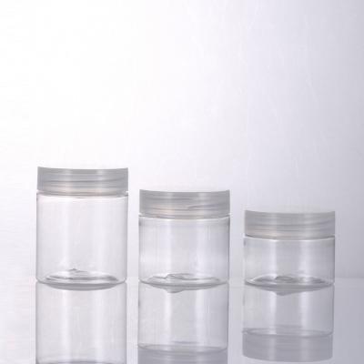 China Cosmetic packaging 30ml 40ml 50ml 60ml 80ml in stock clear pet candy containers food shorage jar with foil cap for sale