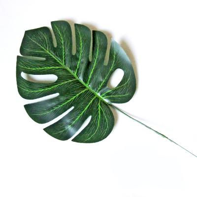 China Plastic Part Supplies Aartificial Tropical Leaves Palm Leaf Artificial For Table Decorations Mats Leaf Decoration for sale