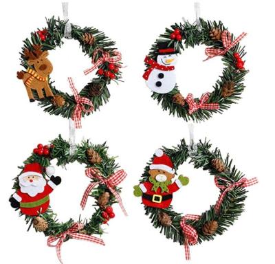 China Hot Selling Garland Pendant Creative Santa Claus Christmas Tree Elk Party Decoration Christmas Decorations Round PVC Ornaments for sale