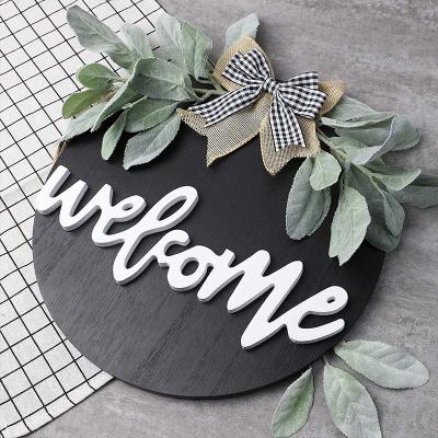 China Nice Wooden Easter Decoration Wreath Shooting Props Black And White Wooden Door Lattice Hanging Garland Welcome Sign Holiday Supplies for sale