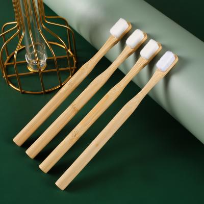 China Hot Selling Reusable Disposable Round Wooden Handle Bamboo Toothbrush Manufacturers With Your Logo for sale