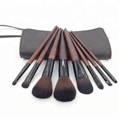 China Imitation Ebony Wood Handle Luxury 8pcs Skin-friendly Cosmetic Brush Set With Travel Pouch for sale