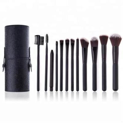 China Skin-friendly OEM Handmade China Made 12pcs Custom Makeup Brush Kit With PU Leather Barrel for sale