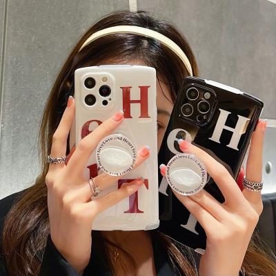 China Simple Anti-fall HEART English Letters With Cell Phone Holder Anti-fall Cell Phone Case For iPhone12 for sale