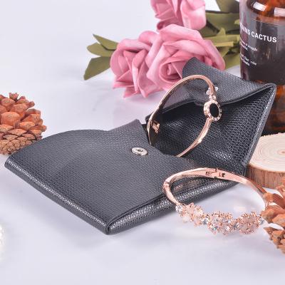 China Travel Jewelry Organizer Roll Lightweight Jewelry Roll Jewelry Case Bag For Bracelets Leather Bag Custom Size Accepted for sale