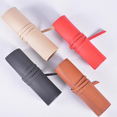 China Travel Jewelry Roll Necklace Earrings Bottom Organizer Rings Bracelet Jewelry Case Bag for Portable Travel Soft Leather and Suede for sale