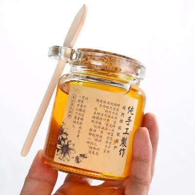 China Wholesale 100ml 250ml Eco-friendly Recyclable Pudding Glass Jar With Cork And Wooden Spoon for sale