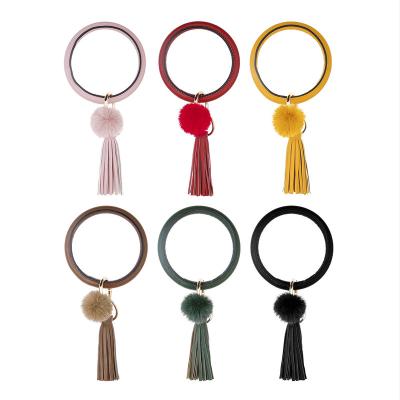 China Large Round PU Bracelet Portable Leather Circle Key Chain Bracelet Tassel Key Chain Key Chain for sale