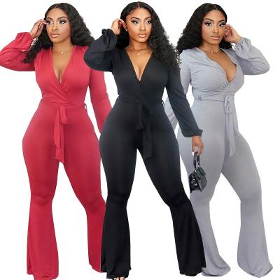 China Wholesale Breathable Irregular Waist Strap V-Neck High V-Neck Trumpet Jumpsuit Ladies Fall Rompers Workout Overalls Long Sleeve Jumpsuit Women for sale