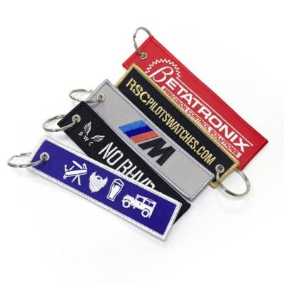 China Custom Fabric Embroidery Key Tags For Motorcycle Ebroidered Keychains for sale