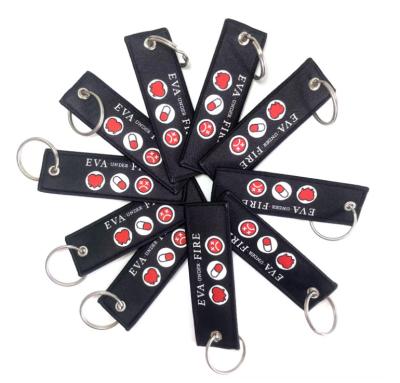 China Custom Woven Logo Embroidered Keyring Jet Tag for Motorcycle Car Anime for sale