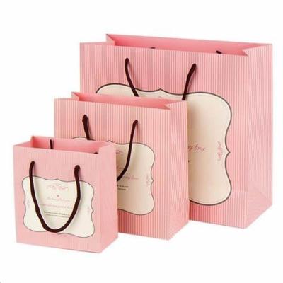 China Promotional Gift Paper Cardboard Carry Bags Jewelry Packaging With Handle for sale