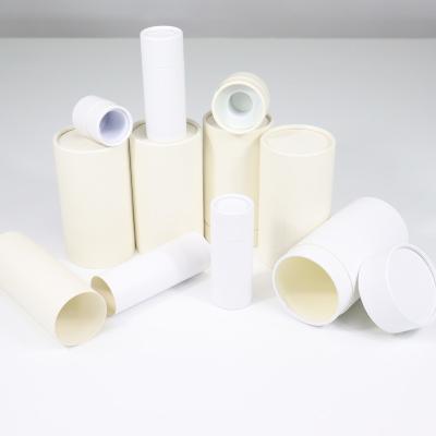 China Recycled materials round cardboard tube skin care packaging essential oil box cosmetic with lips stick tube for sale