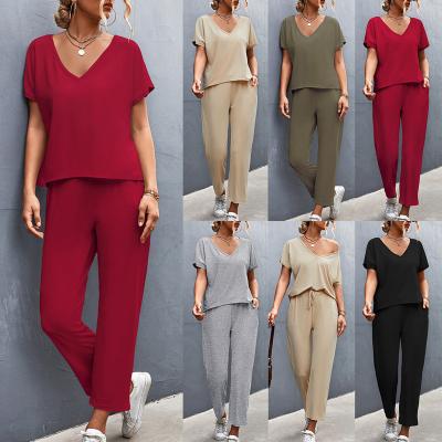 China Solid Color Viable Hot Selling V-neck Women Short Sleeve Sportswear Suit for sale