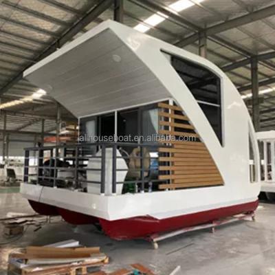 China Modern Prefab Water Mobile Home Tiny Boat House Modular Boathouse House Boat House Container Hotel Party Floating Home Floating Boat for sale