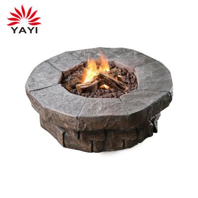 China Outdoor Stone MgO Fire Pit Wood And Metal Round Mines Garden Burning Table for sale